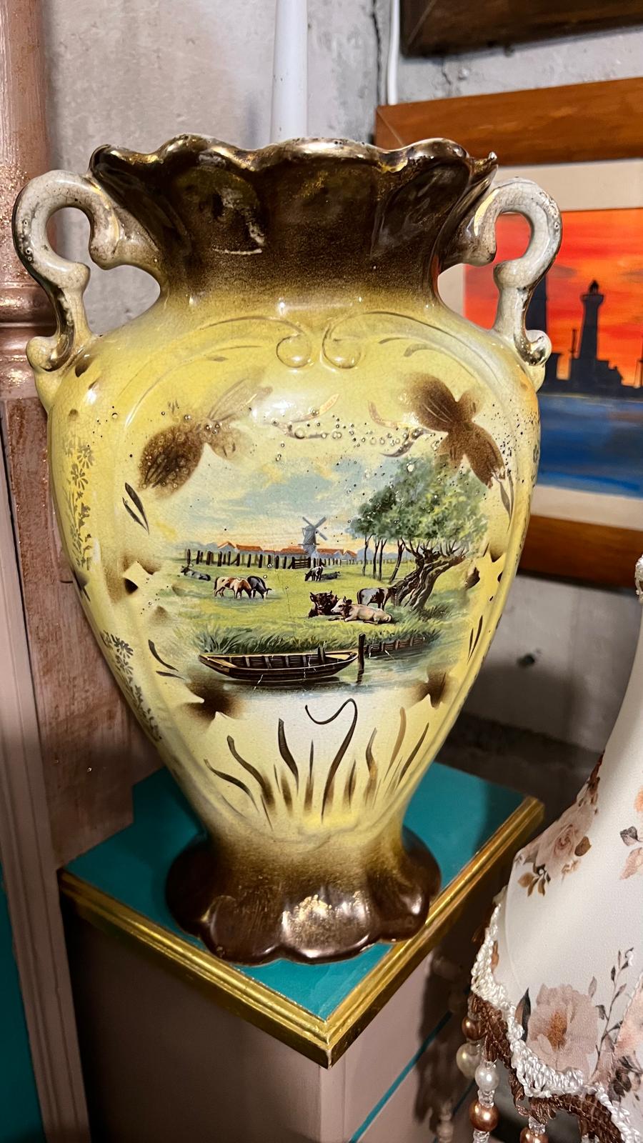 Pair of antique hand-painted ceramic vases with landscape views