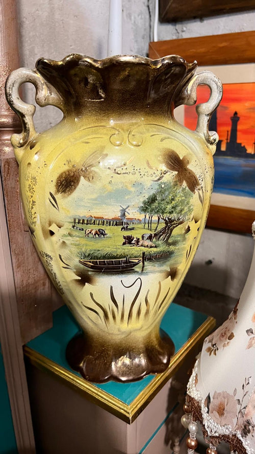 Pair of antique hand-painted ceramic vases with landscape views