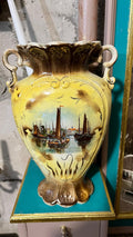 Pair of antique hand-painted ceramic vases with landscape views