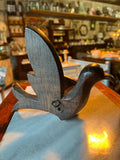Antique hand-carved wooden bird statue