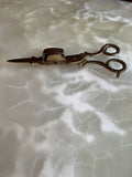 Antique brass candle holder