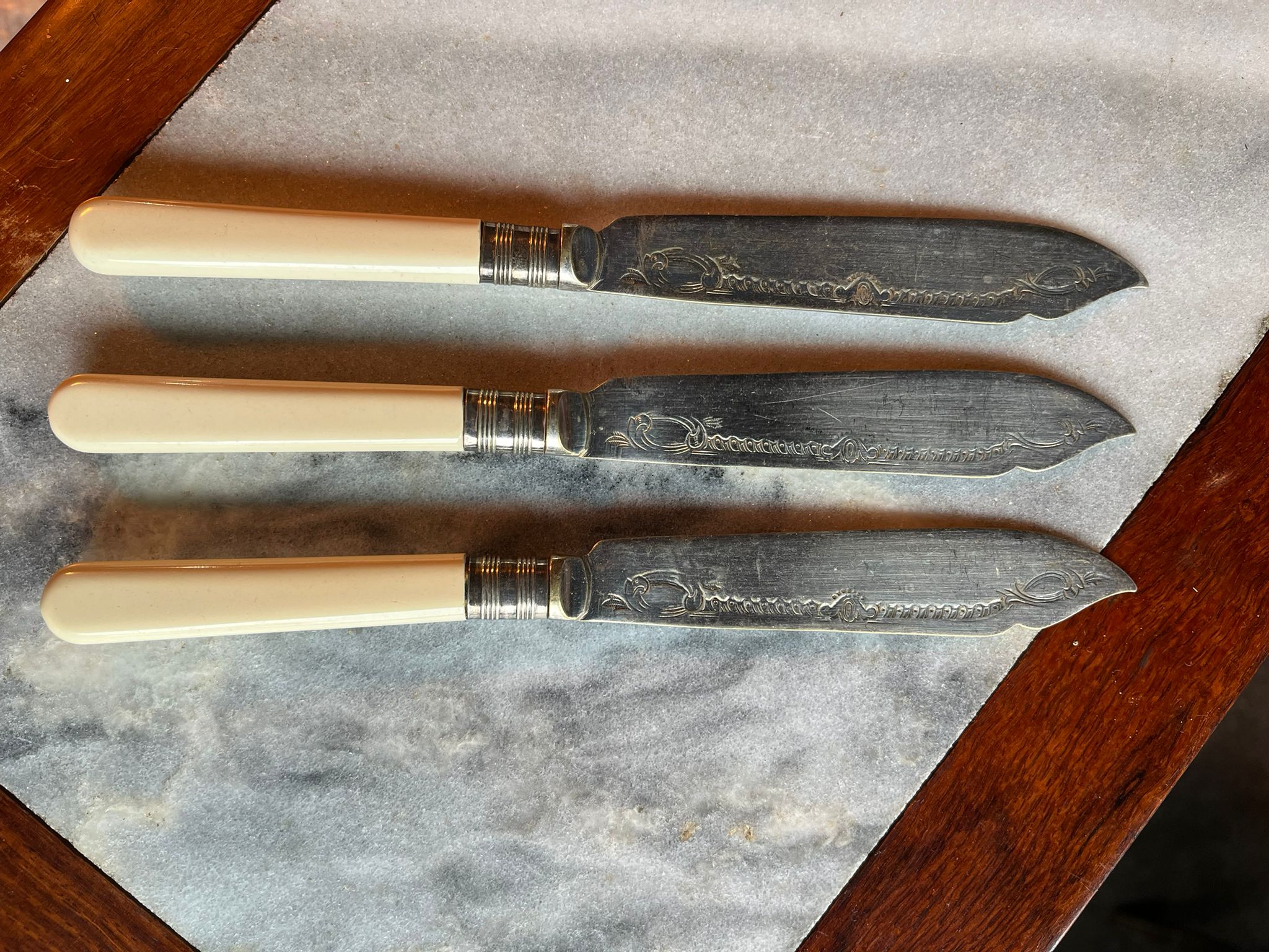 Antique dessert or butter knives (4 pcs)