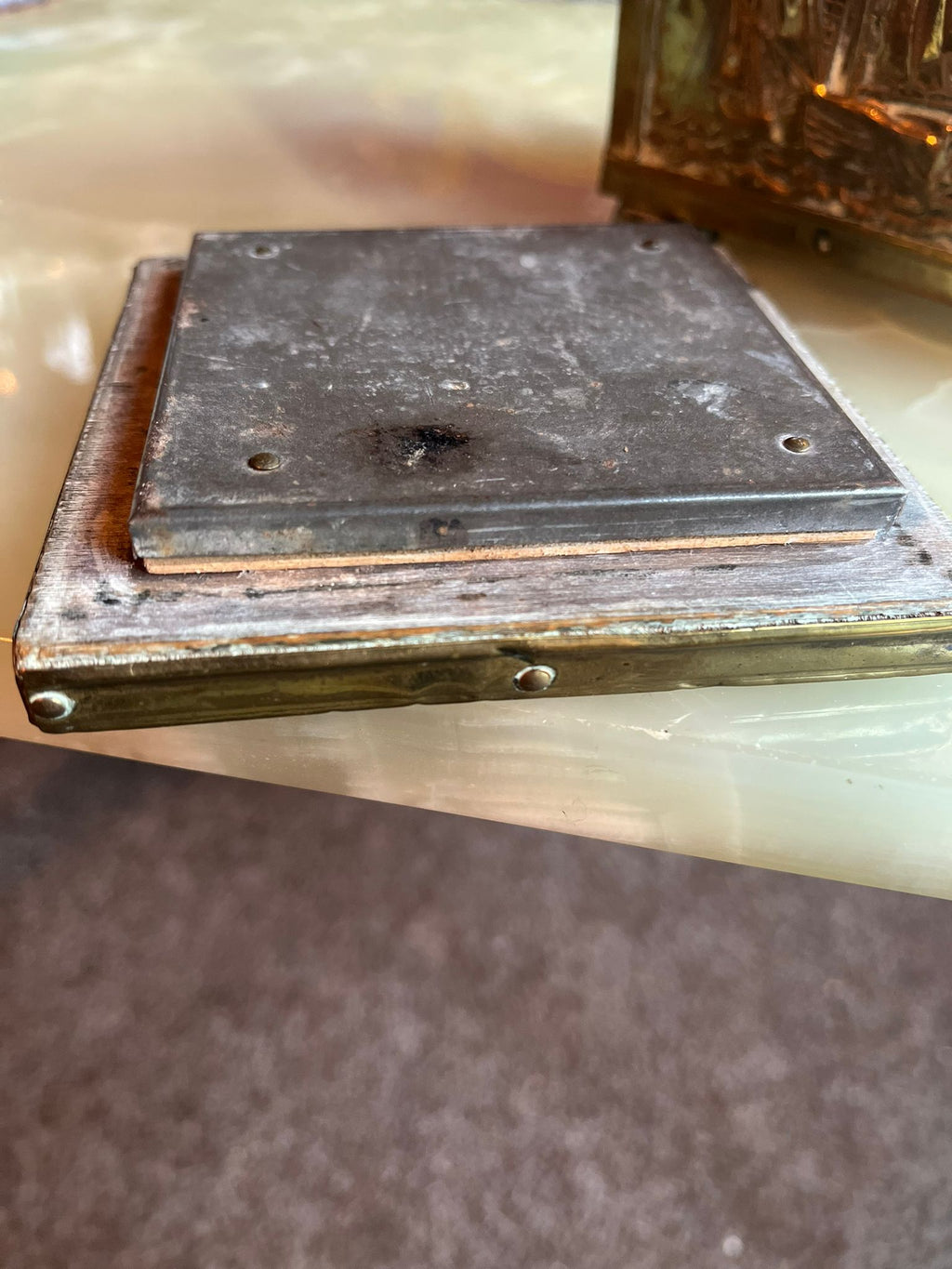 Antique brass tea box with sailing ship relief
