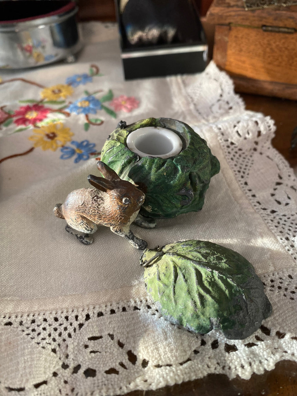 Vintage cabbage-shaped inkwell with a rabbit motif