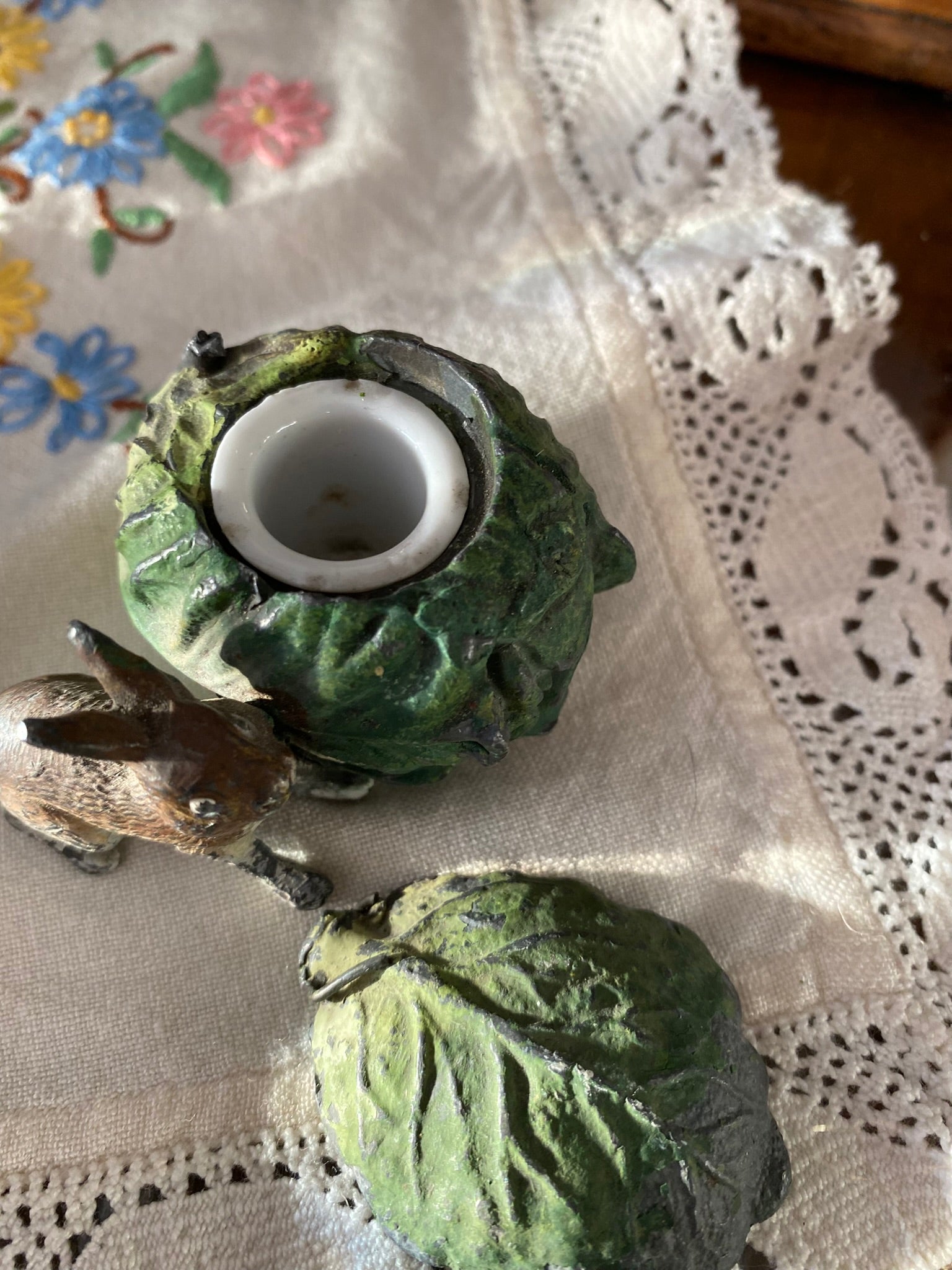 Vintage cabbage-shaped inkwell with a rabbit motif
