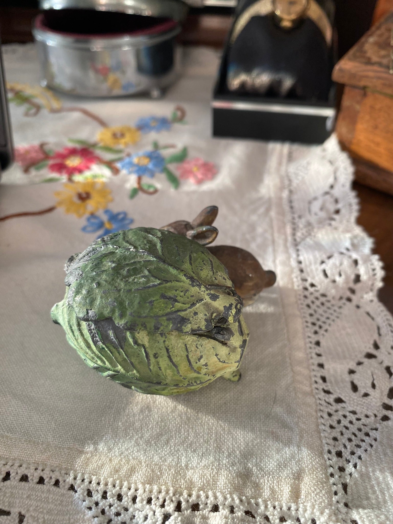 Vintage cabbage-shaped inkwell with a rabbit motif