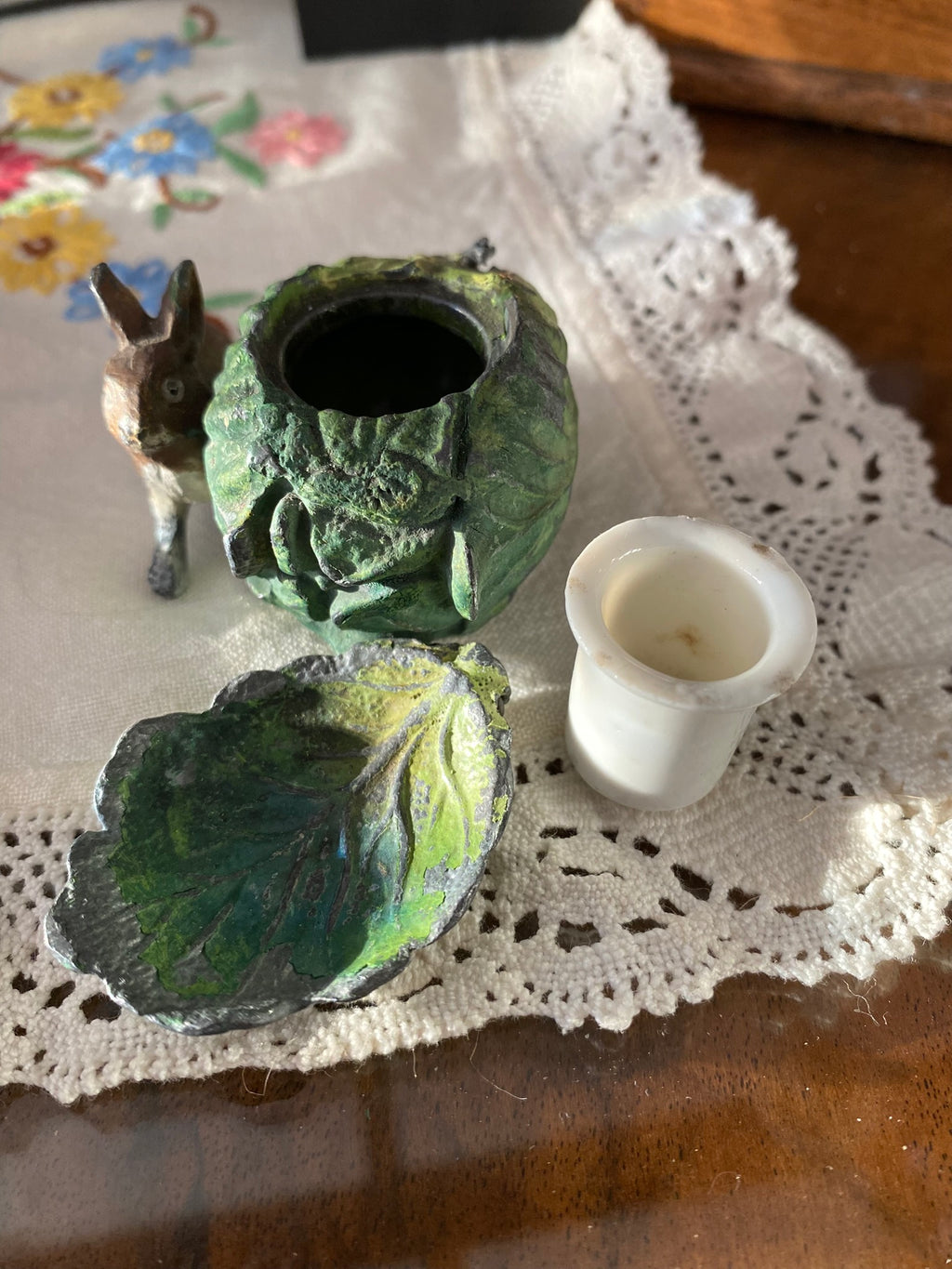Vintage cabbage-shaped inkwell with a rabbit motif