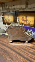Antique silver-plated sugar bowl with spoon