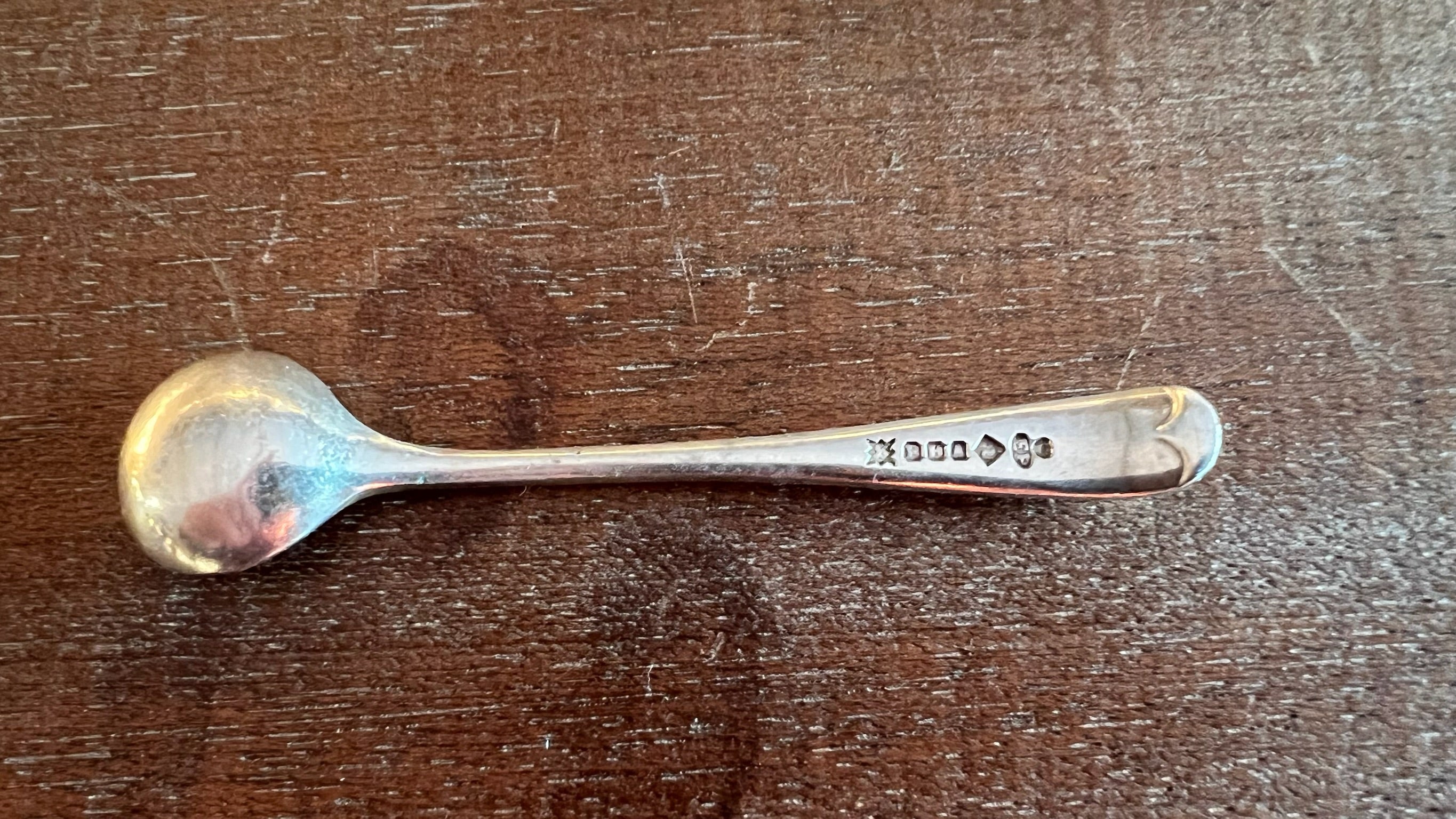 Antique English glass salt shaker with sterling silver spoon