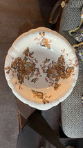 Antique porcelain bowl with brown floral decoration