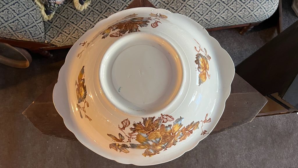Antique porcelain bowl with brown floral decoration