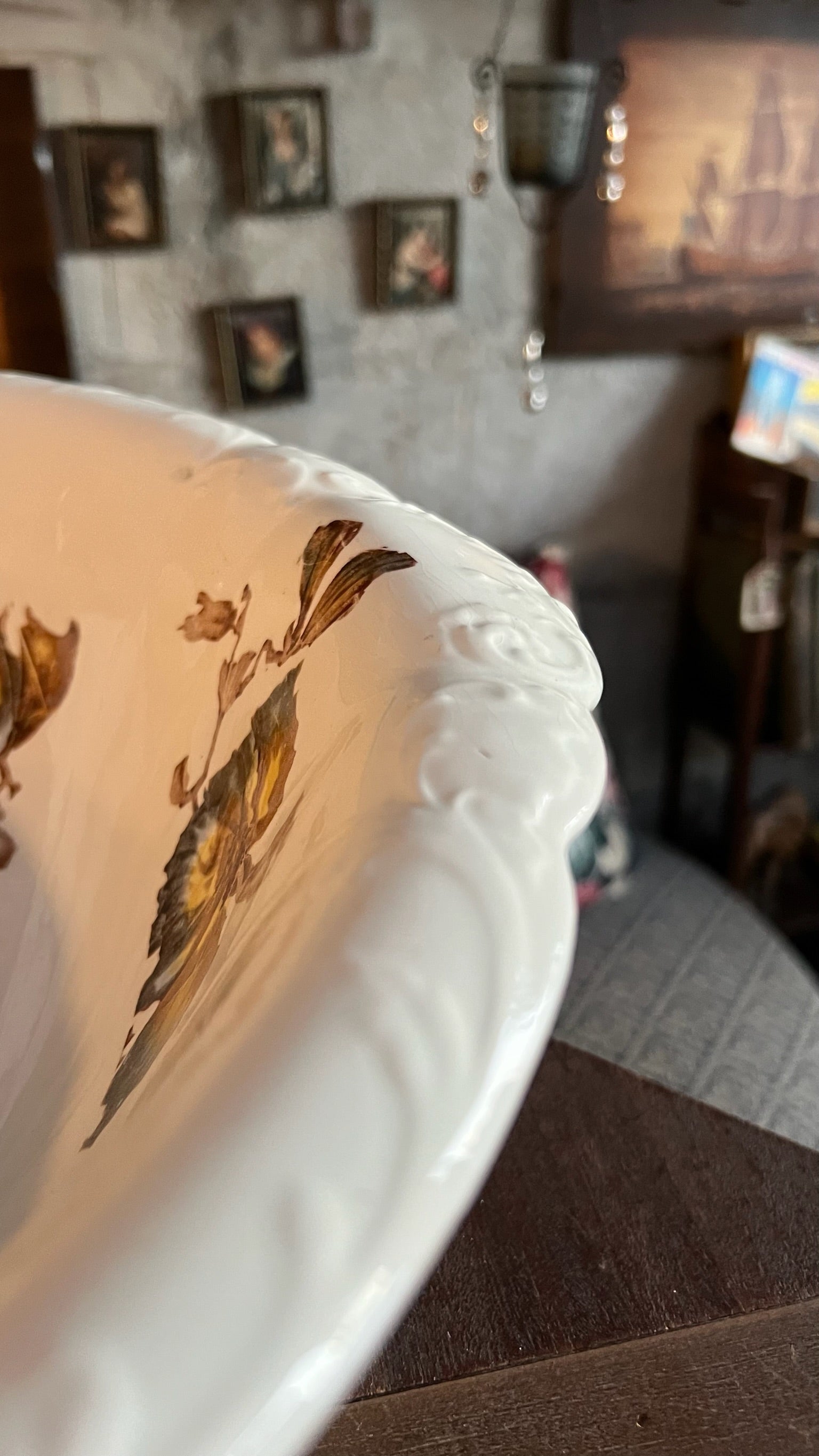 Antique porcelain bowl with brown floral decoration