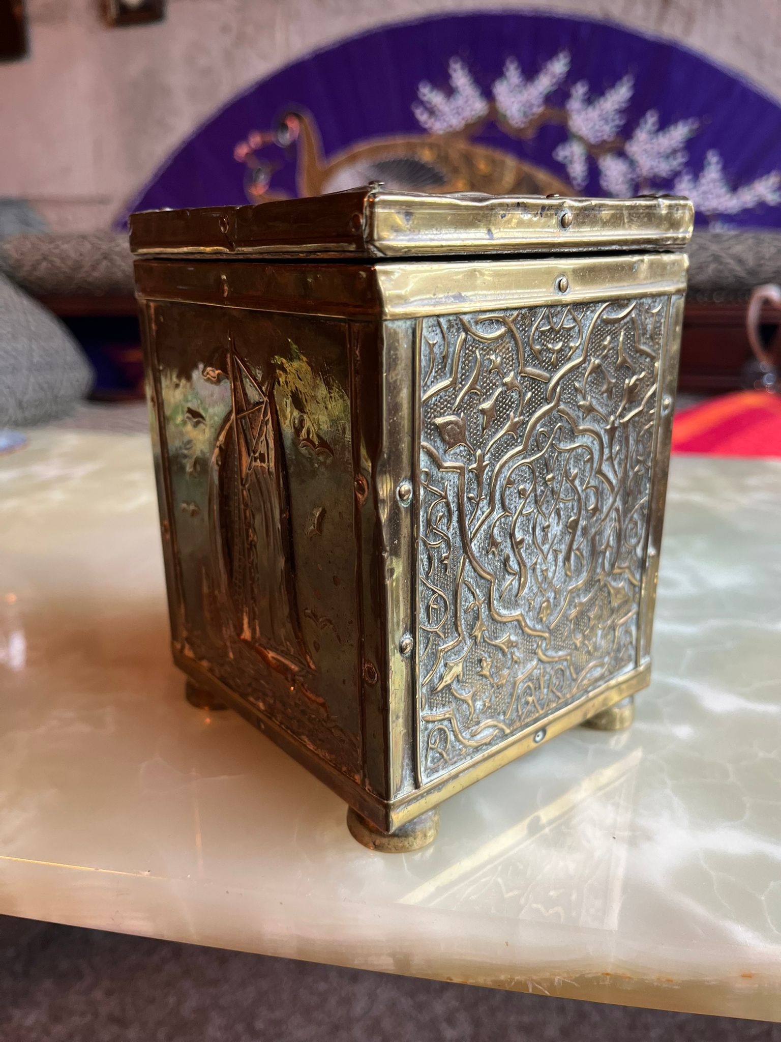 Antique brass tea box with sailing ship relief