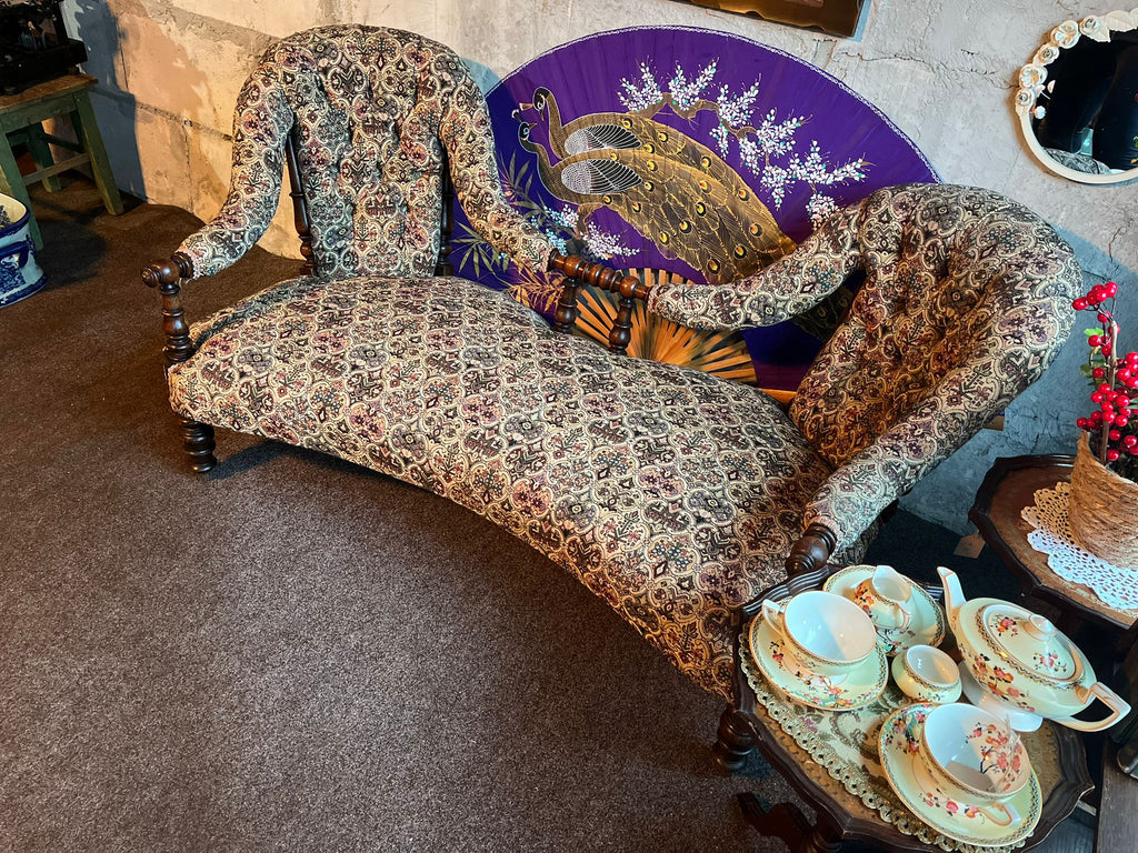 Antique Victorian two-seater “conversation sofa”